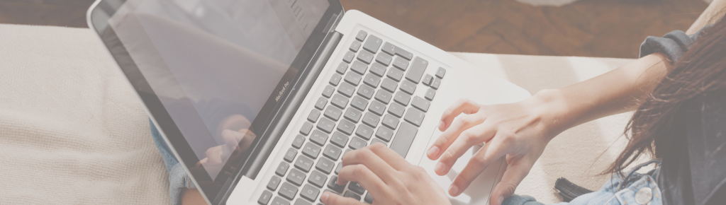 woman typing on computer